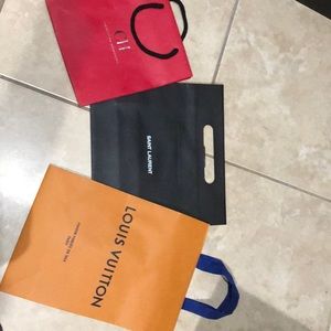 Carolina Herrera, saint laurent, Louis Vuitton bag